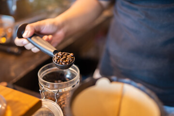 Coffee maker, portafilter with coffee, Useful as background for barista, bar, coffee shop.