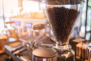 Coffee maker, portafilter with coffee, Useful as background for barista, bar, coffee shop.
