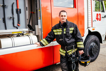 Firefighter, fireman. Emergency safety. Protection, rescue from danger. Adult man, hero in...