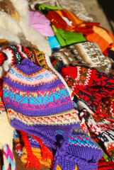 Group of colorful Chilean snow caps for sale at Chiloe market.