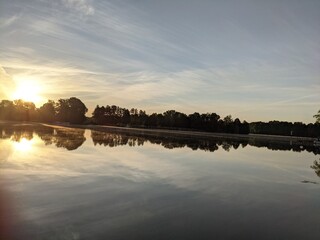 Obraz premium sunset over the river