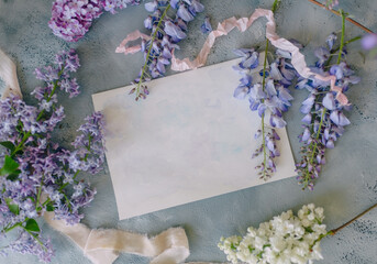 mockup of a sheet of paper for a signature or a card for a holiday with a bouquet of flowers
