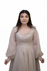 Naklejka premium Portrait of woman in dress posing in studio isolated on white background. Long black hair girl