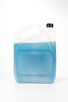 Blue antifreeze in a 5-liter canister. Non-freezing cleaning liquid. There are places for a label. Frontal view.