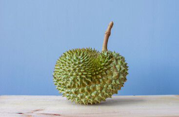 Fresh durian fruit on wood table - 503964819