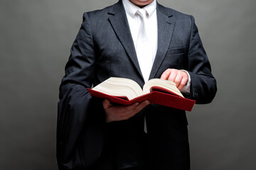 german lawyer with a robe and a book