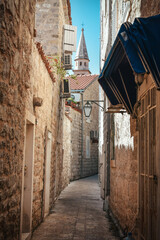 view narrow street in old district of Budva, Montenegro