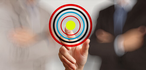 man with target tool showing his goal