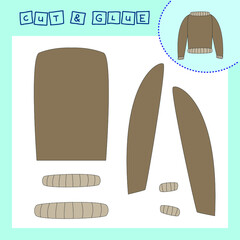 Children's paper puzzle with a  sweaters. Baby education cut and paste applique for preschool age.