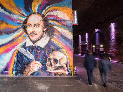 London (UK) - 11.12.2019 - View of the purple-lit tunnel with Shakespeare's mural
