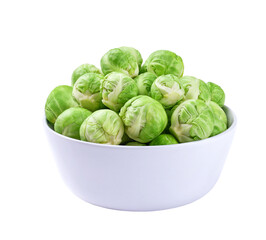 organic brussel sprouts in a white bowl isolated on white background.
