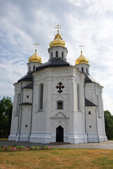Fototapeta na wymiar Ancient Ukrainian Orthodox Church. Ukrainian baroque architecture. Catherine's Church is a functioning church in Chernihiv, Ukraine. Church is distinguished by its five gold domes
