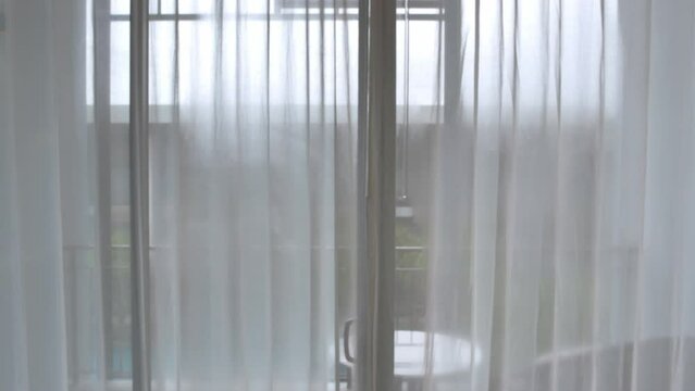 POV to the white curtain in  hotel, summer staycation vacation relaxing time