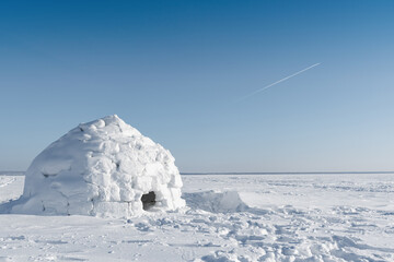 Real snow igloo house in the winter.	