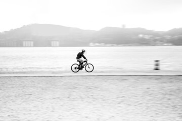 Fototapeta premium person riding a bike
