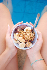 Eating Brazilian açai in the swimmingpool