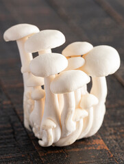 White Button Mushrooms on a Wooden Table