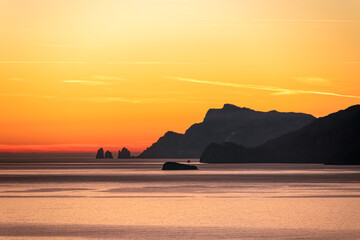 Panoramic sunset view from Praiano at Mediterranean Sea, Italy, Campania, Europe. Silhouette of Li...