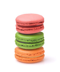 Front view of three colorful macaroons