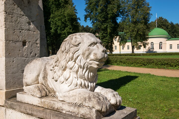 Village of Stepanovskoe-Volosovo. Russia, Tver region.  Stone lion, guarding the entrance to the estate. Sculptural fragment of the entrance gate to the Kurakins' estate.