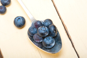 fresh blueberry on silver spoon