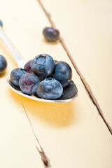 fresh blueberry on silver spoon