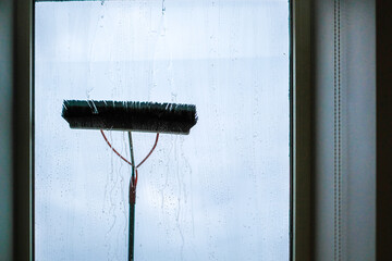 Window cleaning using telescopic water brush and wash system. Commercial window cleaning from the...