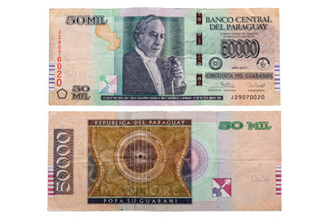Fifty thousand Guarani note front and back isolated on white background. Guarani is the national...