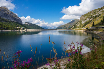 A beautiful summer view of Lago Fedaia in the Dolomites.