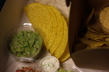 taco shell tortilla and avocado guacamole