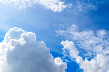 Blue sky and white clouds with sunlight,Blue sky and floating clouds