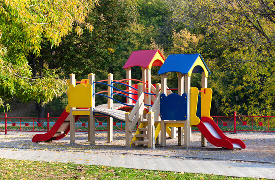View of colorful playground in a autumn city park