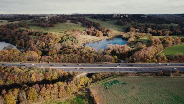 Aerial drone view over M1 motorway near Hardwick Hall, Derbyshire, England, United Kingdom, Europe