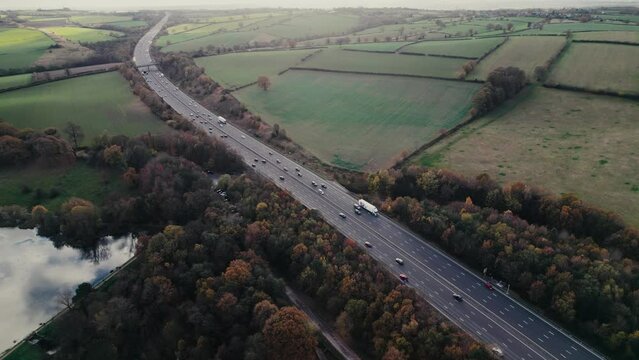 Aerial drone view over M1 motorway near Hardwick Hall, Derbyshire, England, United Kingdom, Europe