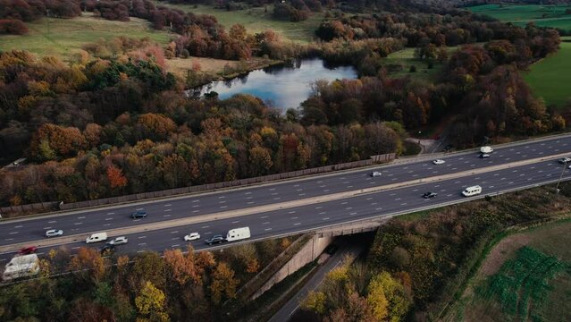 Aerial drone view over M1 motorway near Hardwick Hall, Derbyshire, England, United Kingdom, Europe