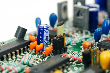 Electronic and Resistor component capacitor on a printed circuit board.	