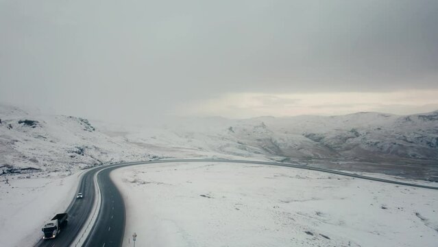 Highway panorama, volcanic landscape,above, aerial view, wild nature in snowy winter, Icelandic Highlands, Pakgil, Suourland, Iceland, Polar Regions
