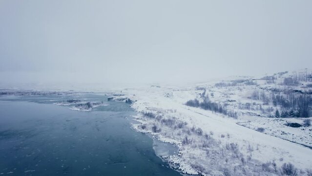 Mountain panorama, volcanic landscape and river, glacier river,above, aerial view, in snowy winter, wild nature, Icelandic Highlands, Pakgil, Suourland, Iceland, Polar Regions
