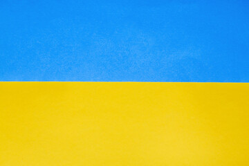 paper ukrainian flag background. Blue and yellow color