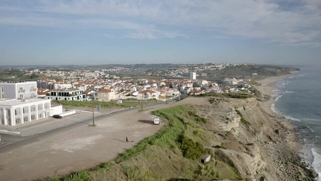 Drone aerial view of a camper van on a cliff and the coastline of Lourinha, Oeste, Centro, Portugal, Europe