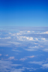 Fototapeta na wymiar Nature view of blue sky with fluffy white cloud using for wallpaper page, background or wallpaper