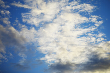 High clouds in the summer sky. Sky background. Meteorological observations of the sky.