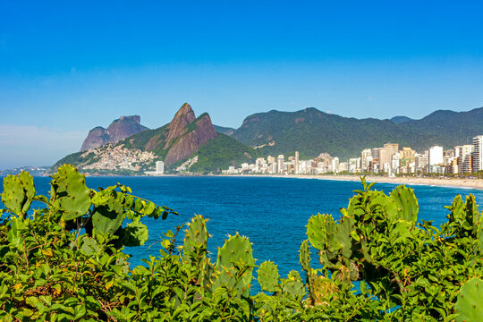 Panoramic image of Ipanema beach in Rio de Janeiro with the sea, buildings and hills