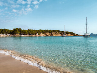 Fototapeta na wymiar Beautiful empty sandy beach in Ibiza island