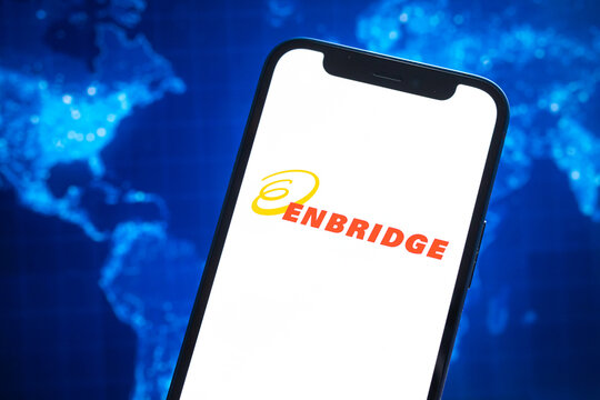 Index of Enbridge oil prices, logo close-up. Petroleum stock market graphs, global financial background. Gasoline, energy and diesel industry concept