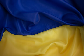 National flag of Ukraine close up silk background