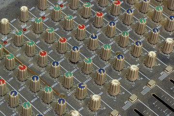Music analog mixing console. Dusty mixing console. 
