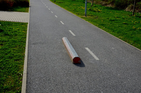 Skateboard park with concrete cement surface with concrete skateboard obstacles is designed for roller sports. Cycling is not allowed except for freestyle bikes. icing winter morning sunrise