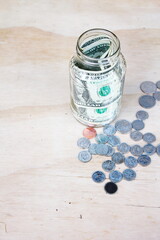 US dollars in jam jars, family savings, poor people's savings.