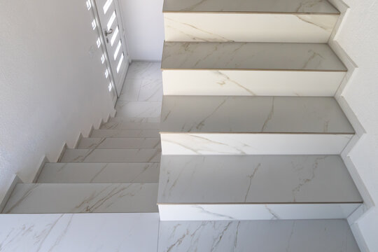 Elegant Staircase With White Marble Steps